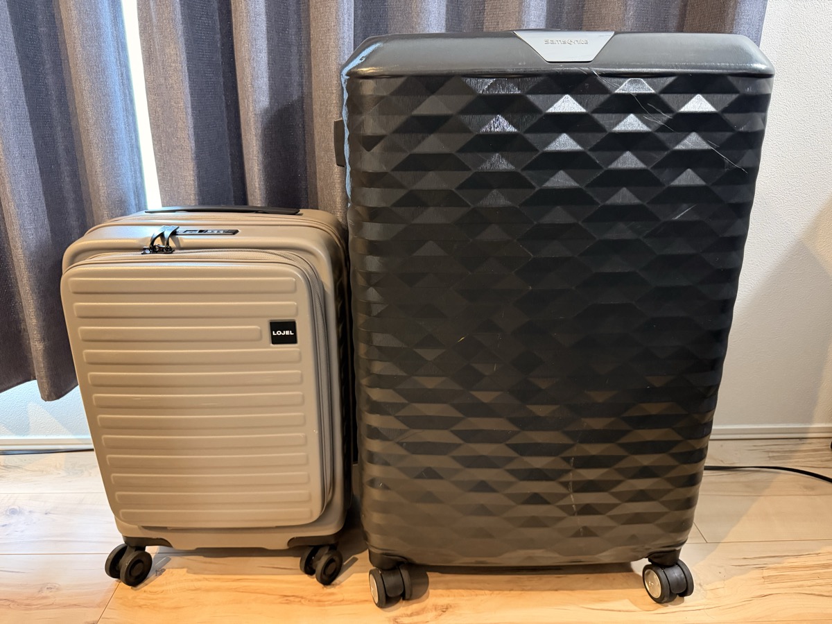 LOJEL carry-on (left) and large Samsonite (right)
